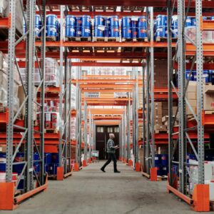 Man Walking in Warehouse