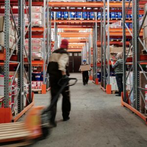 Photo of Men Working in a Warehouse